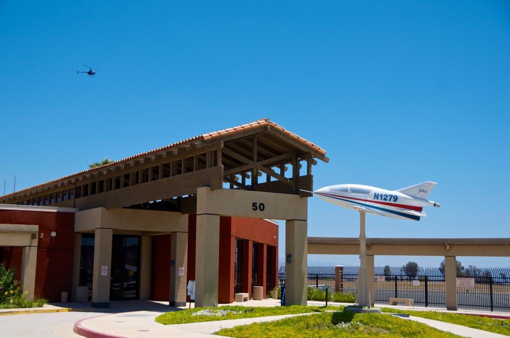 Terminal Bldg with helicopter flying